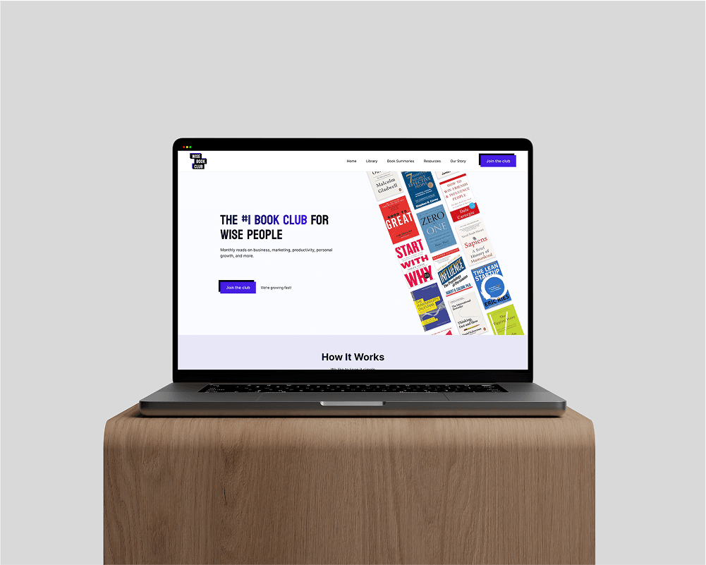 Laptop on desk showing website